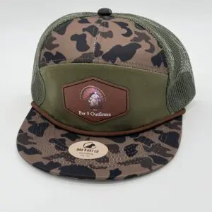 Camouflage trucker hat with mesh back.